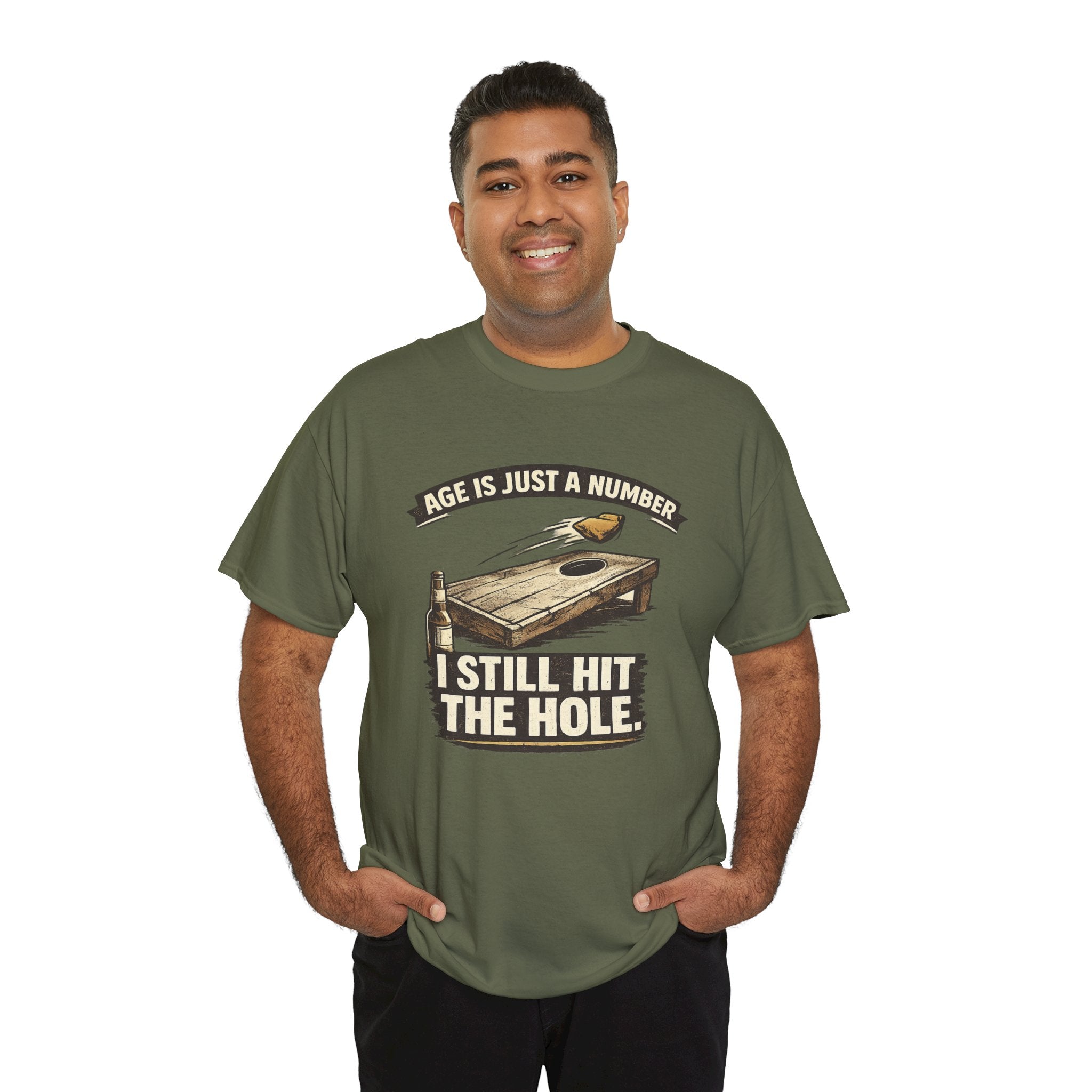 Cornhole Graphic Tee — "Age Is Just a Number, I Still Hit the Hole" Funny Corn Toss Shirt