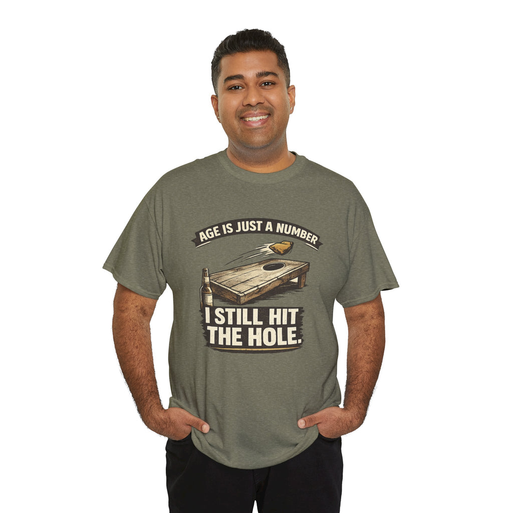 Cornhole Graphic Tee — "Age Is Just a Number, I Still Hit the Hole" Funny Corn Toss Shirt