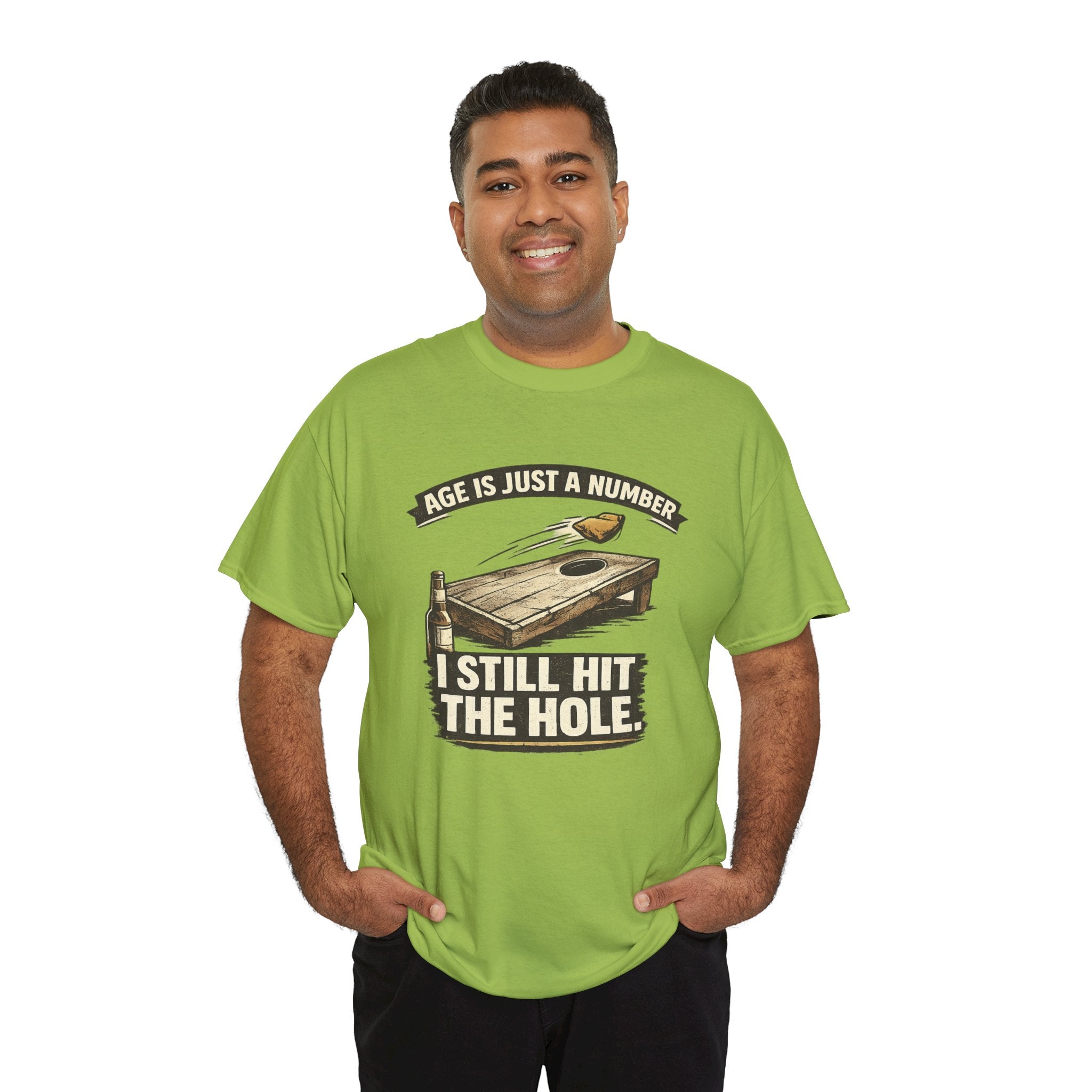 Cornhole Graphic Tee — "Age Is Just a Number, I Still Hit the Hole" Funny Corn Toss Shirt