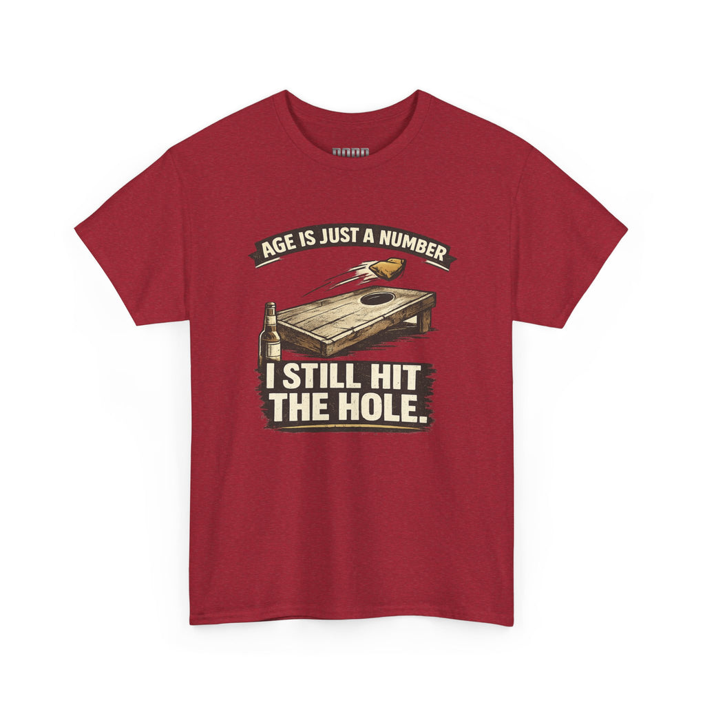 Cornhole Graphic Tee — "Age Is Just a Number, I Still Hit the Hole" Funny Corn Toss Shirt