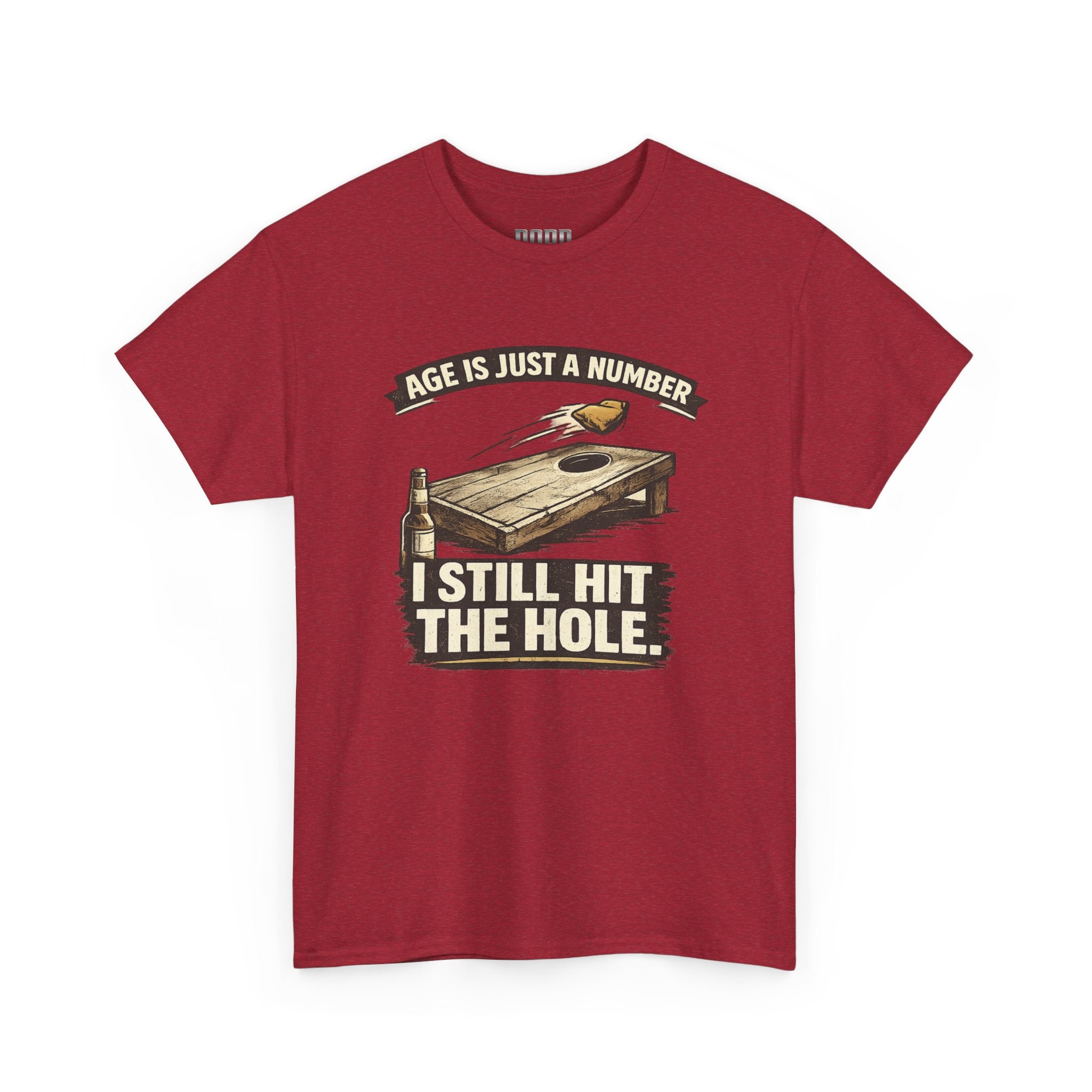 Cornhole Graphic Tee — "Age Is Just a Number, I Still Hit the Hole" Funny Corn Toss Shirt