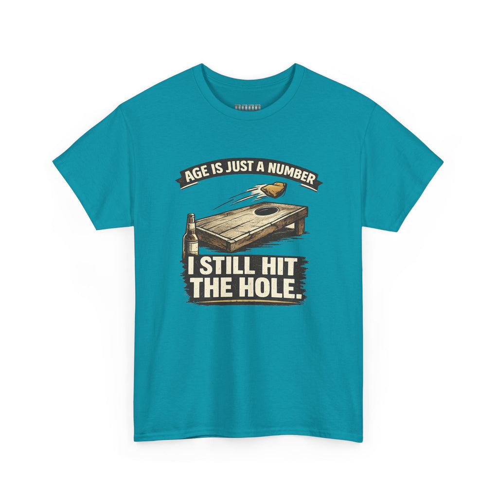 Cornhole Graphic Tee — "Age Is Just a Number, I Still Hit the Hole" Funny Corn Toss Shirt