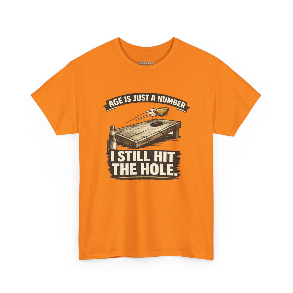 Cornhole Graphic Tee — "Age Is Just a Number, I Still Hit the Hole" Funny Corn Toss Shirt