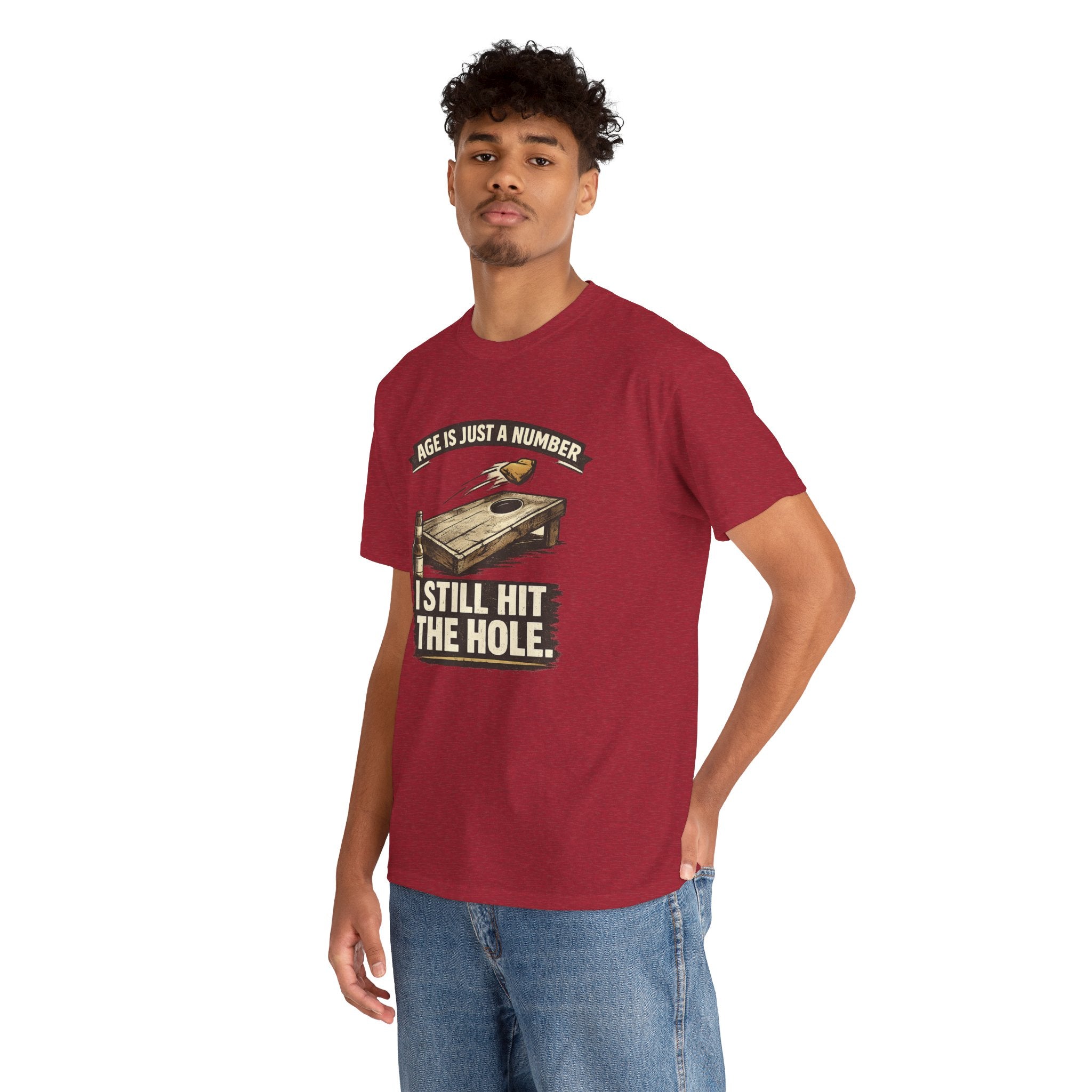Cornhole Graphic Tee — "Age Is Just a Number, I Still Hit the Hole" Funny Corn Toss Shirt