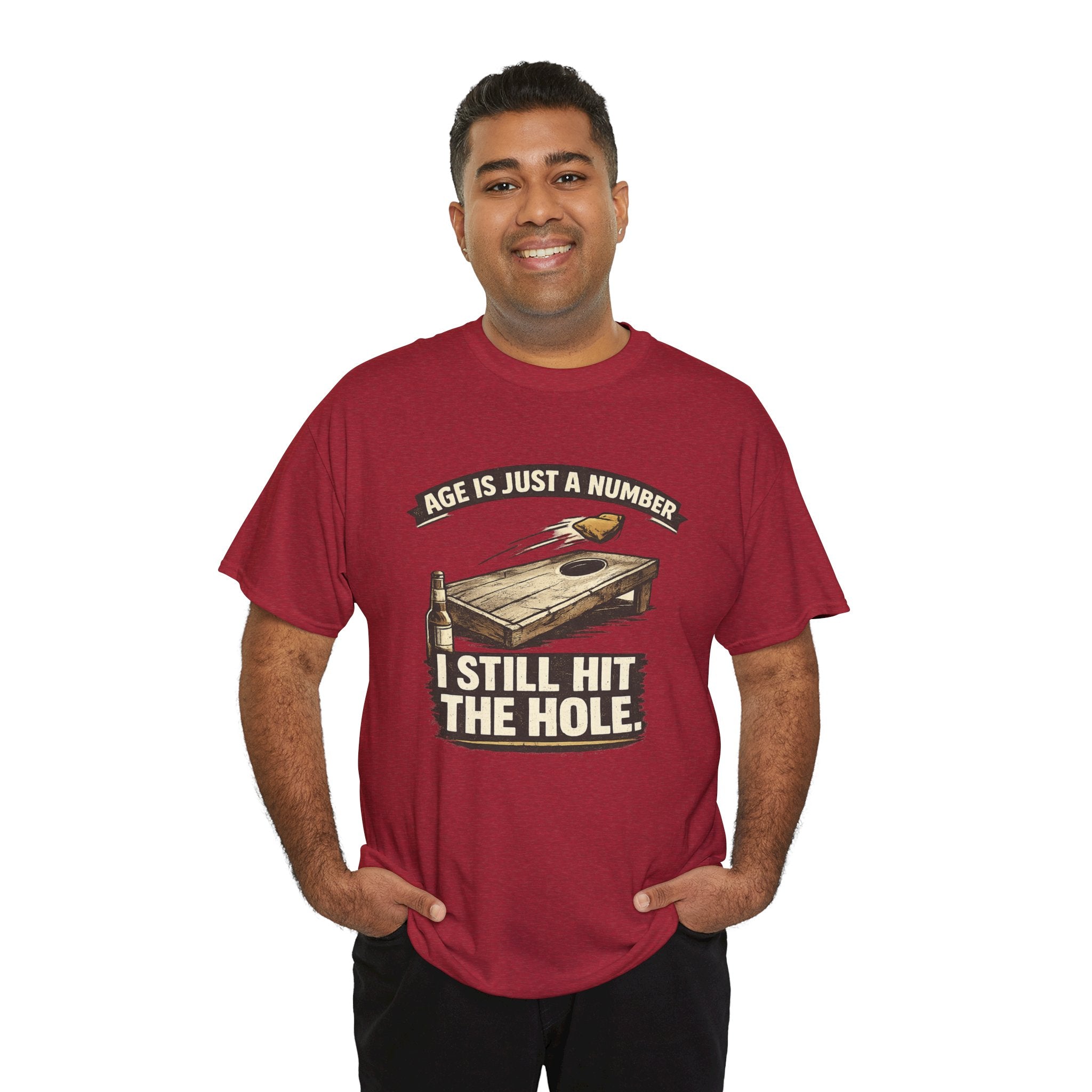 Cornhole Graphic Tee — "Age Is Just a Number, I Still Hit the Hole" Funny Corn Toss Shirt