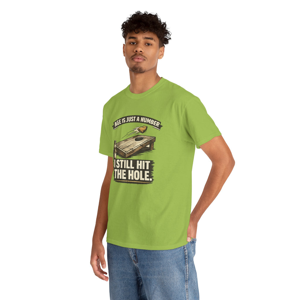 Cornhole Graphic Tee — "Age Is Just a Number, I Still Hit the Hole" Funny Corn Toss Shirt