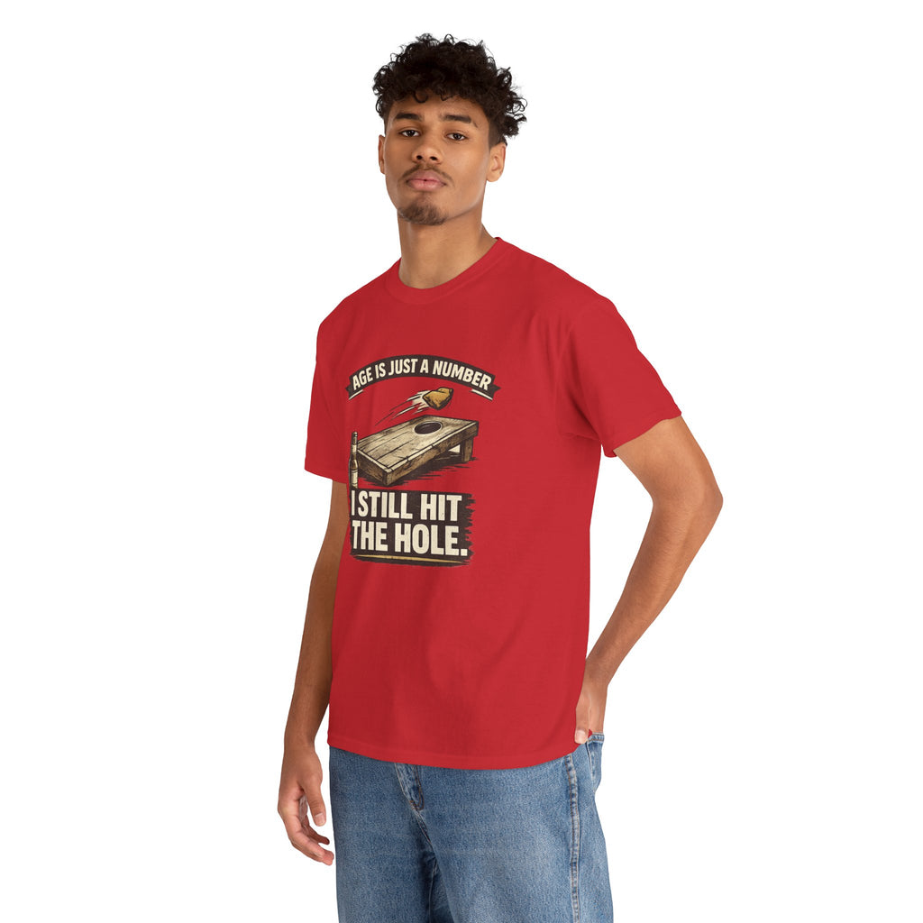 Cornhole Graphic Tee — "Age Is Just a Number, I Still Hit the Hole" Funny Corn Toss Shirt
