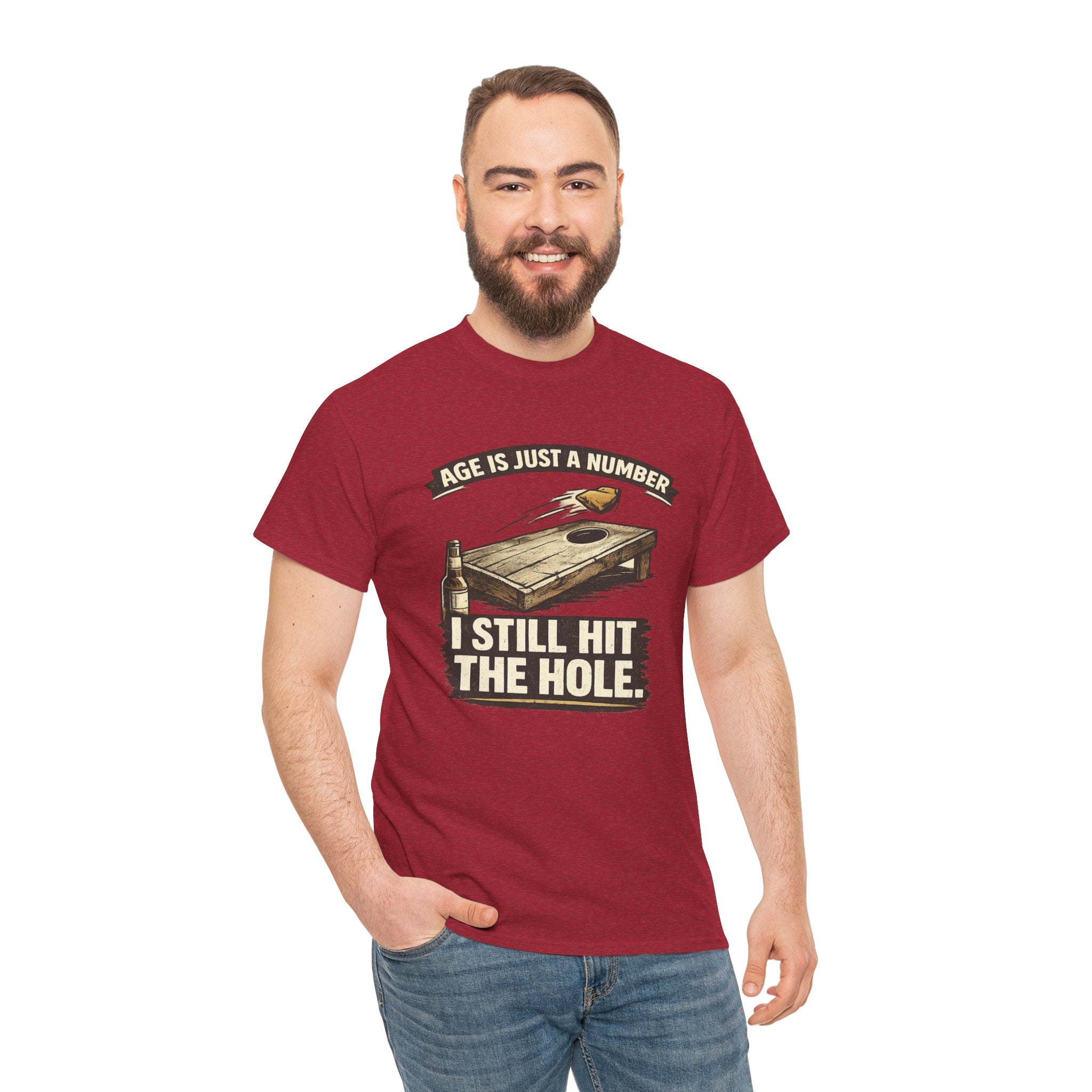 Cornhole Graphic Tee — "Age Is Just a Number, I Still Hit the Hole" Funny Corn Toss Shirt