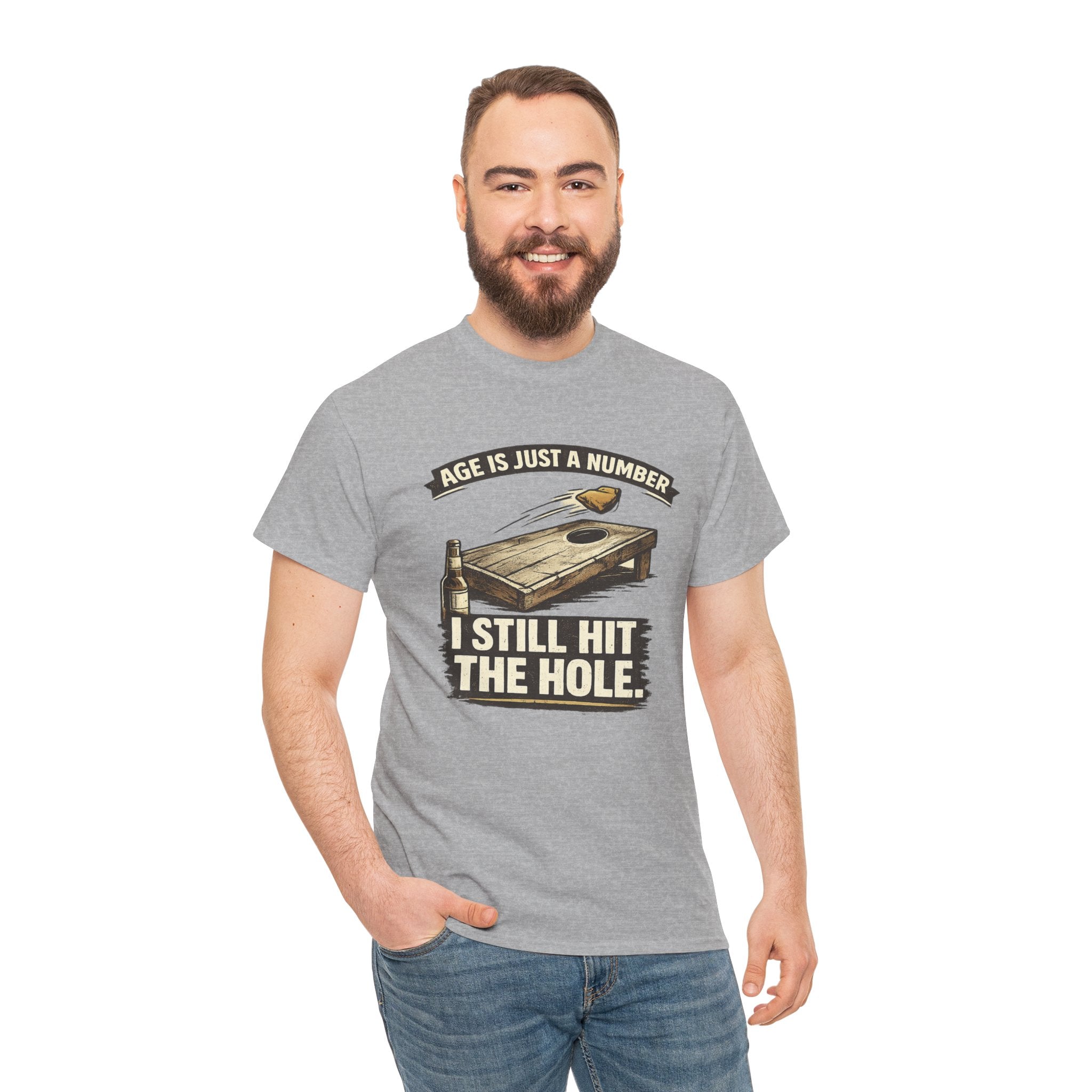 Cornhole Graphic Tee — "Age Is Just a Number, I Still Hit the Hole" Funny Corn Toss Shirt