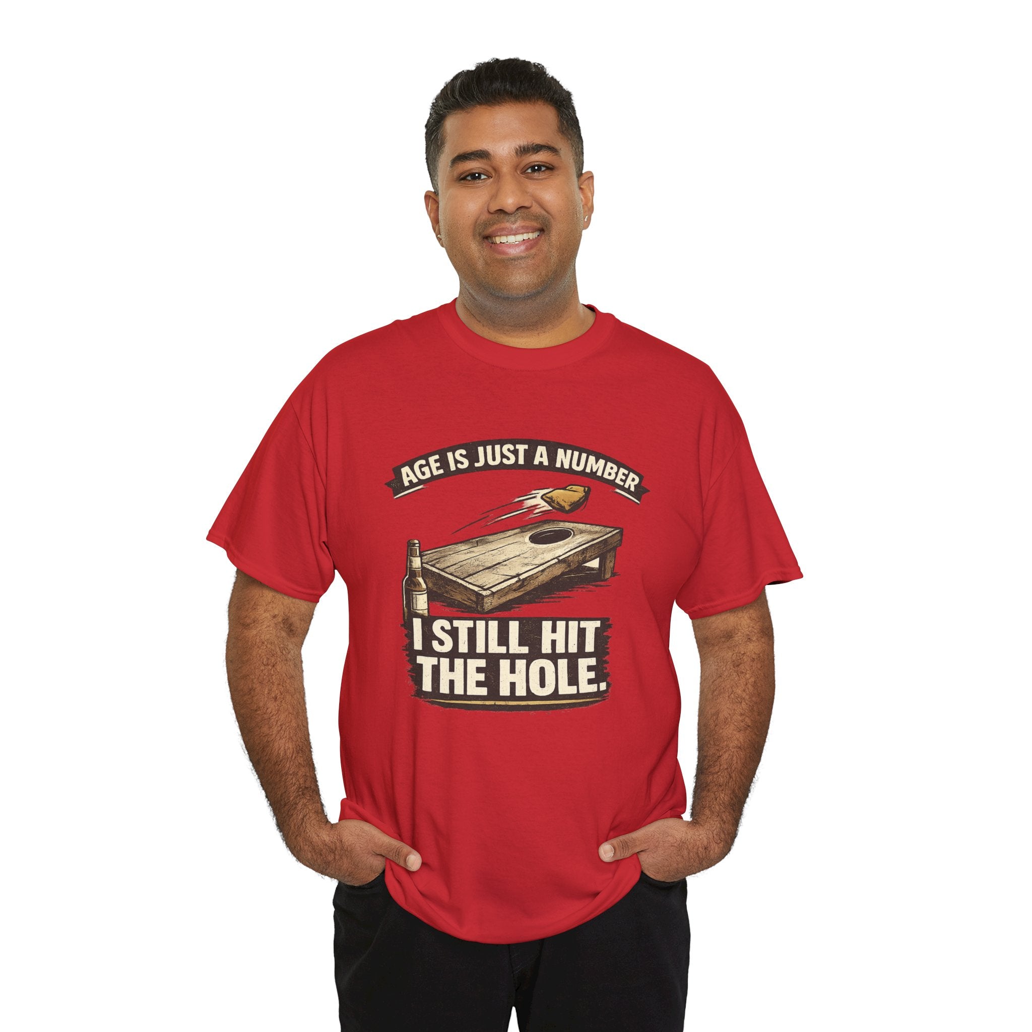 Cornhole Graphic Tee — "Age Is Just a Number, I Still Hit the Hole" Funny Corn Toss Shirt