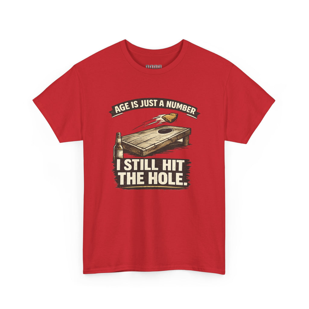 Cornhole Graphic Tee — "Age Is Just a Number, I Still Hit the Hole" Funny Corn Toss Shirt
