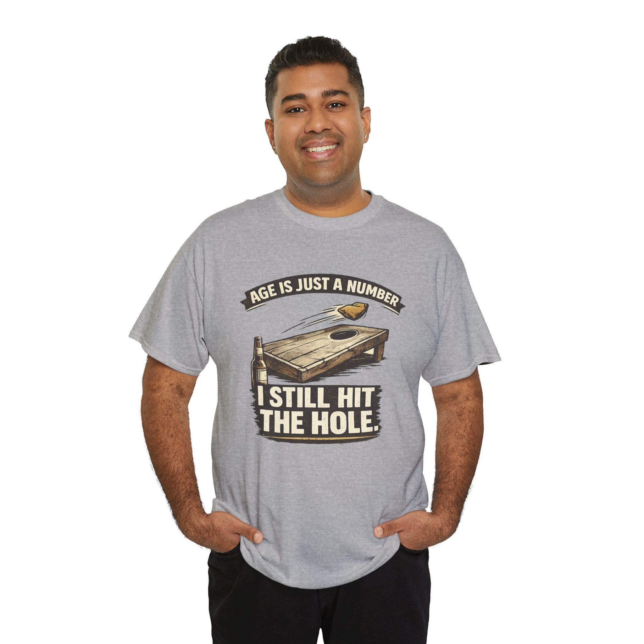 Cornhole Graphic Tee — "Age Is Just a Number, I Still Hit the Hole" Funny Corn Toss Shirt